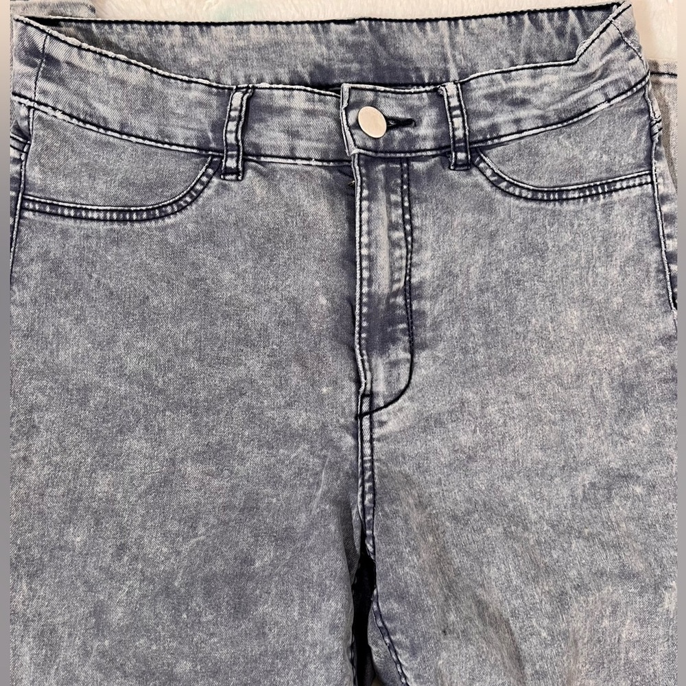Wash style jean. Grayish.